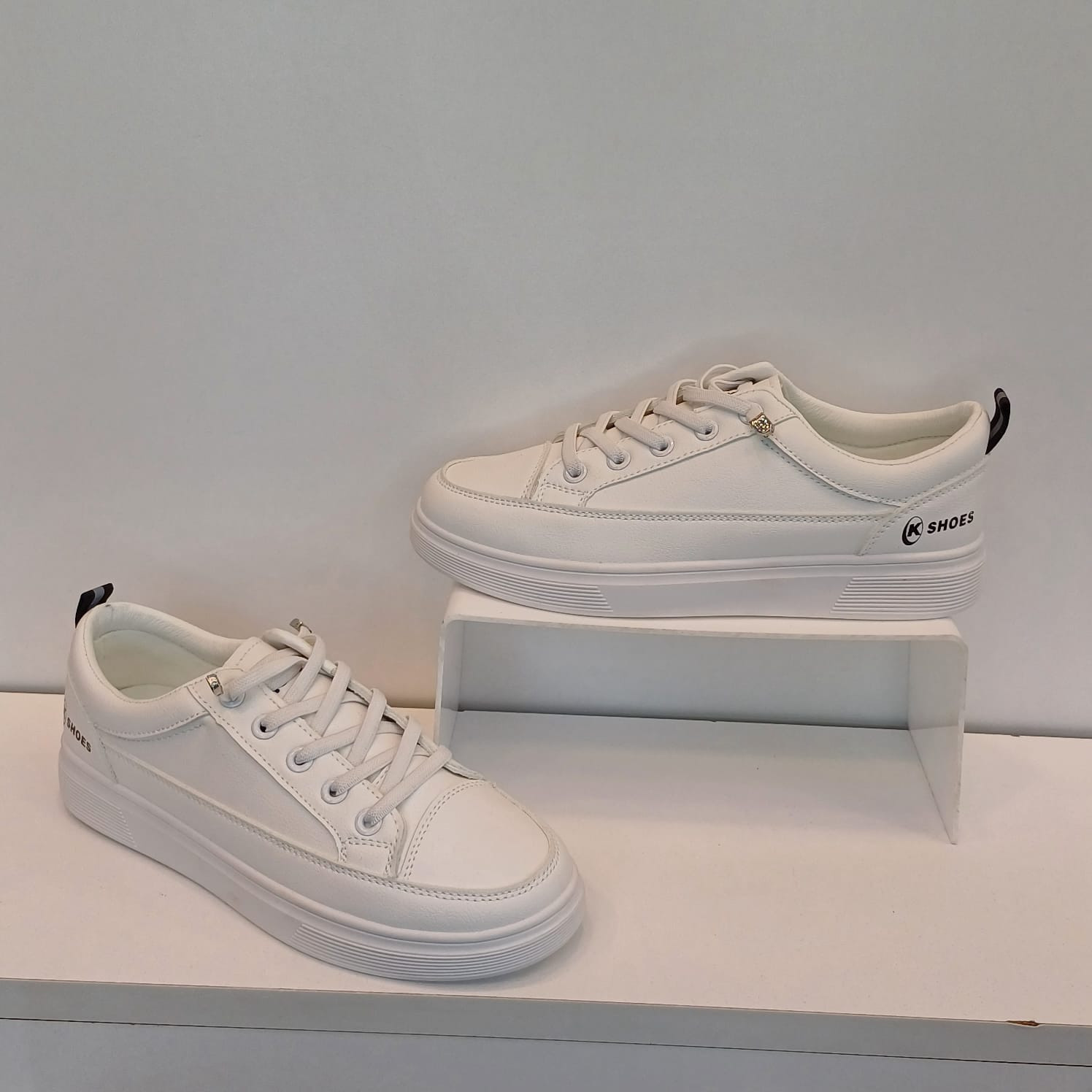 Women White Solid Sneakers